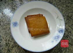 香干炒萝卜干的做法图解2