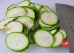 梅粉腌橄榄的做法图解2