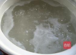 皮蛋火腿粥的做法图解5