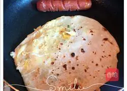 Illustration of how to make egg-filled pancakes 3