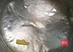 排骨菜干粥的做法图解3