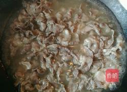 酸汤金针肥牛锅的做法图解11