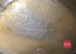 皮蛋鸡肉小米粥的做法图解3
