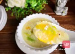 Illustration of how to make pumpkin flower rock sugar millet porridge 9