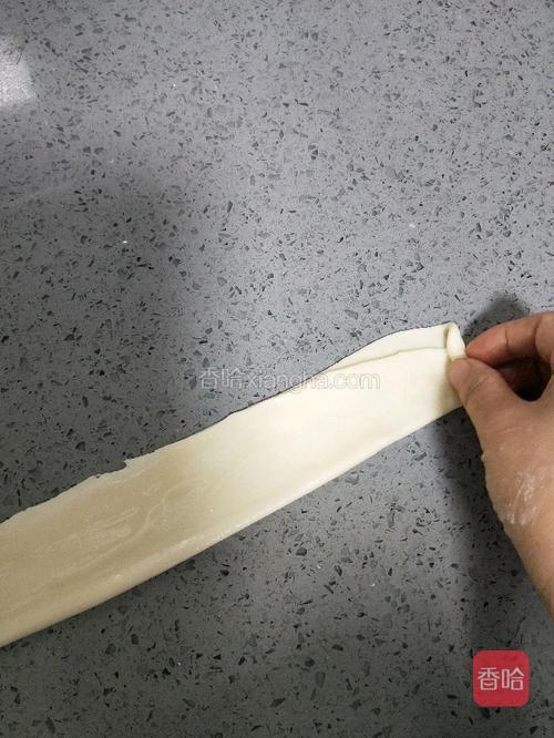 从一边卷起。主页有小视频。