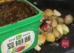 Illustration of how to make stir-fried abalone with soy sauce 7